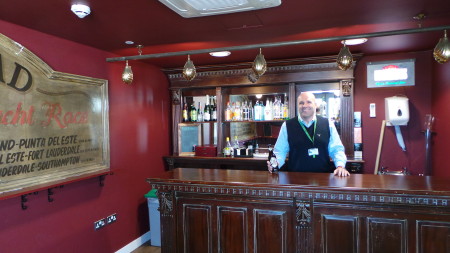 What UK workplace is complete without its own pub. That's Dom, the CEO, behind the bar.