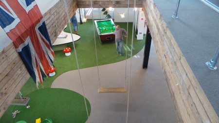 A game of pool in progress in the middle of the work day.